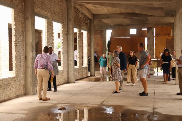 Fourth-generation J.C. Newman Cigar Co. owner Drew Newman leads a tour of the 115-year-old Sanchez y Haya building in Ybor City during Tampa Archives Awareness Week