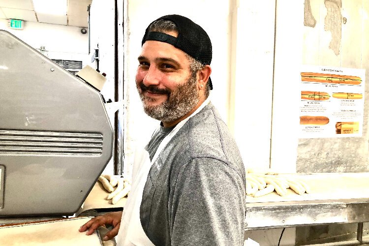 Master baker Anthony Ali has been at La Segunda for 26 years.