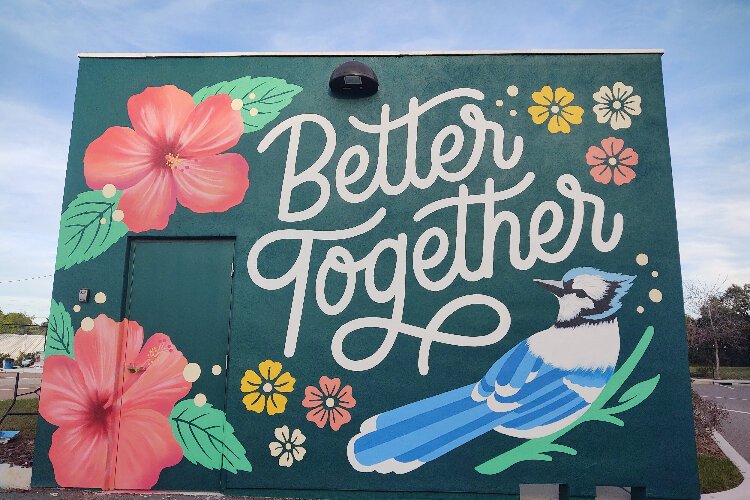 Creative Pinellas' public art initiatives include mural projects like local artist Leo Gomez's "Better Together" at the Lealman Exchange Community Center.