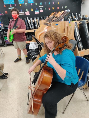 Shore Elementary Magnet School of the Arts teacher Melissa Grady with a student.