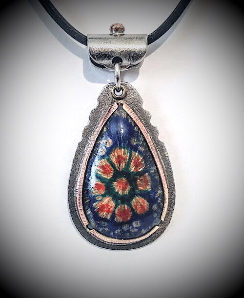 Gulfport jewelry-maker Doug D'souza creates eye-catching organic, rustic-style pieces.