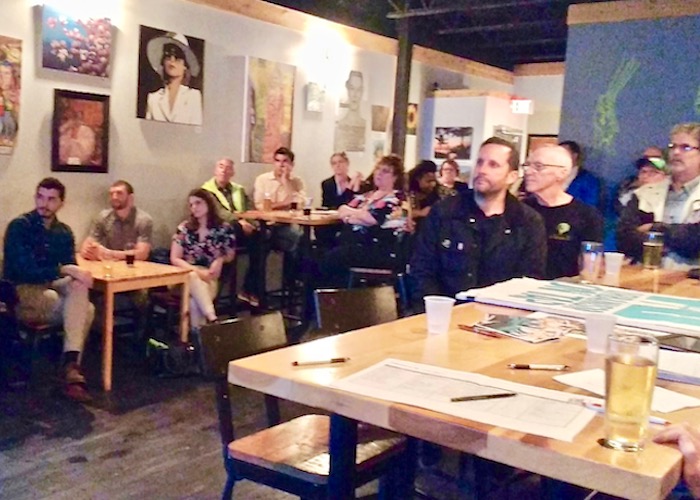 About 50 people gather at Hidden Springs Ale Works for an Urbanism on Tap workshop on the future of the Yellow Brick Row Business Association.