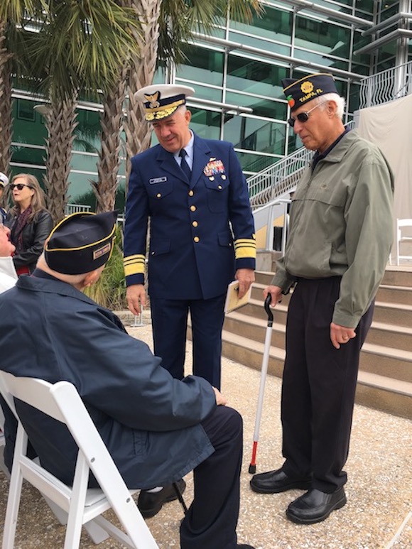 Admiral Karl Schultz, Commander of the U.S. Coast Guard Atlantic, greets veterans.