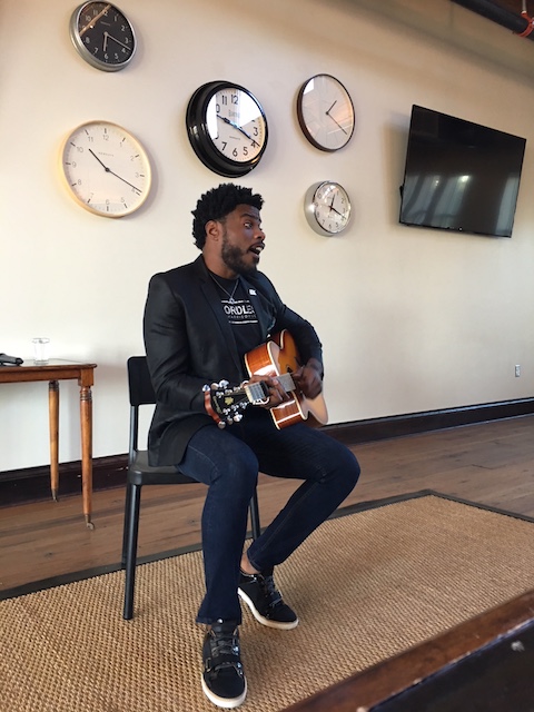 Alex Harris of Arts Conservatory for Teens performing at Cafe con Tampa at the Oxford Exchange