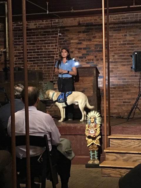 A trainer works with Bolt of Southeastern Guide Dogs.