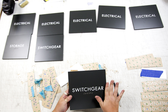 Dee Pavoni works on a job at Creative Sign Designs.