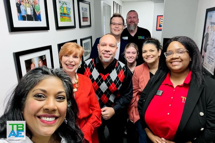 Safe and Sound Hillsborough Executive Freddy Barton, "Connecting with Kim” host Kim Droege, and the TBAE team.