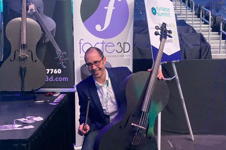 Arnold James of Forte3D with one of the company's carbon fiber 3D printed cellos.