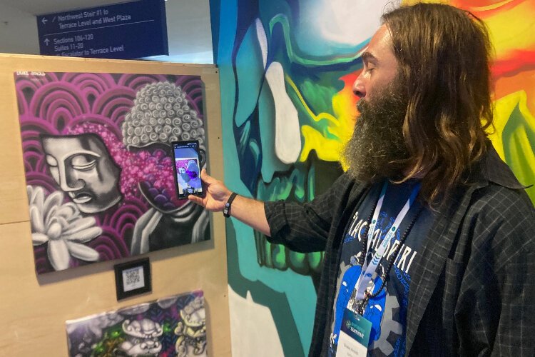 Drake Arnold demonstrates how augmented reality technology brings his artwork to life.