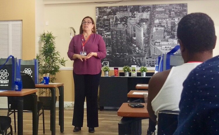 Monica Herrera, Director of THAP group’s Synergy Health Centers, teaches a PLUS+ ME class.