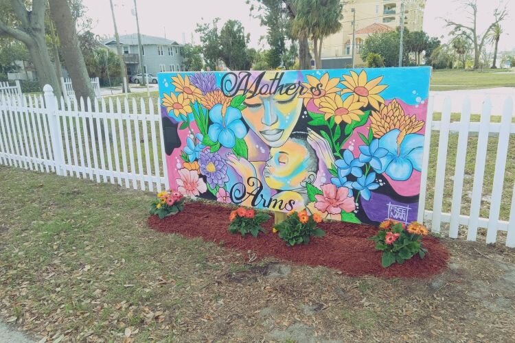 The welcoming, calming environment at Clearwater nonprofit A Mother's Arms includes a painting by local artist James Kitchens (aka Freeman)