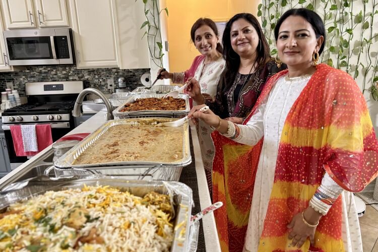Friends Sabeen Hasni, Naila Khan, and Sadia Farrukh with an Eid lunch complete with chicken biryani, haleem, and more