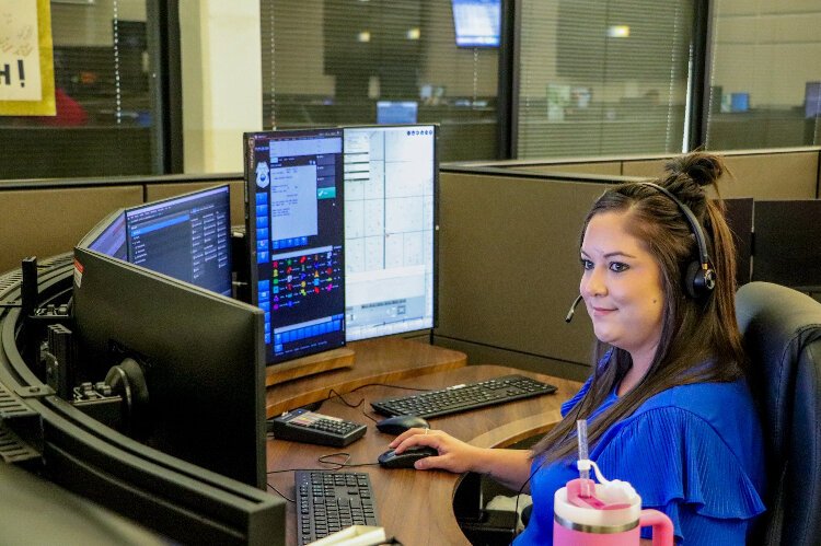 A new partnership program places Crisis Center of Tampa Bay mental health specialists in the Tampa Police Department 911 dispatch center.
