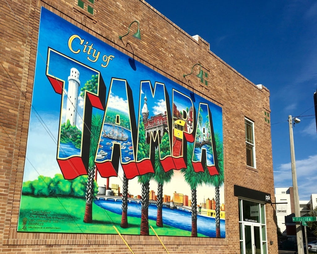 Photo of a colorful, painted mural on a brick wall that says "City of Tampa"