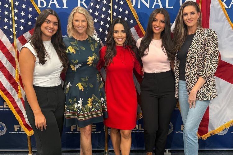The Redefining Refuge team, with founder and Executive Director Natasha Nascimento in the center, during Operation Dragon Eye, a two-week missing child operation across Tampa Bay considered the most successful child recovery operation is U.S. history